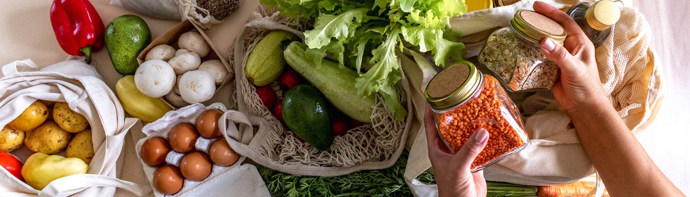 hands unpacking groceries